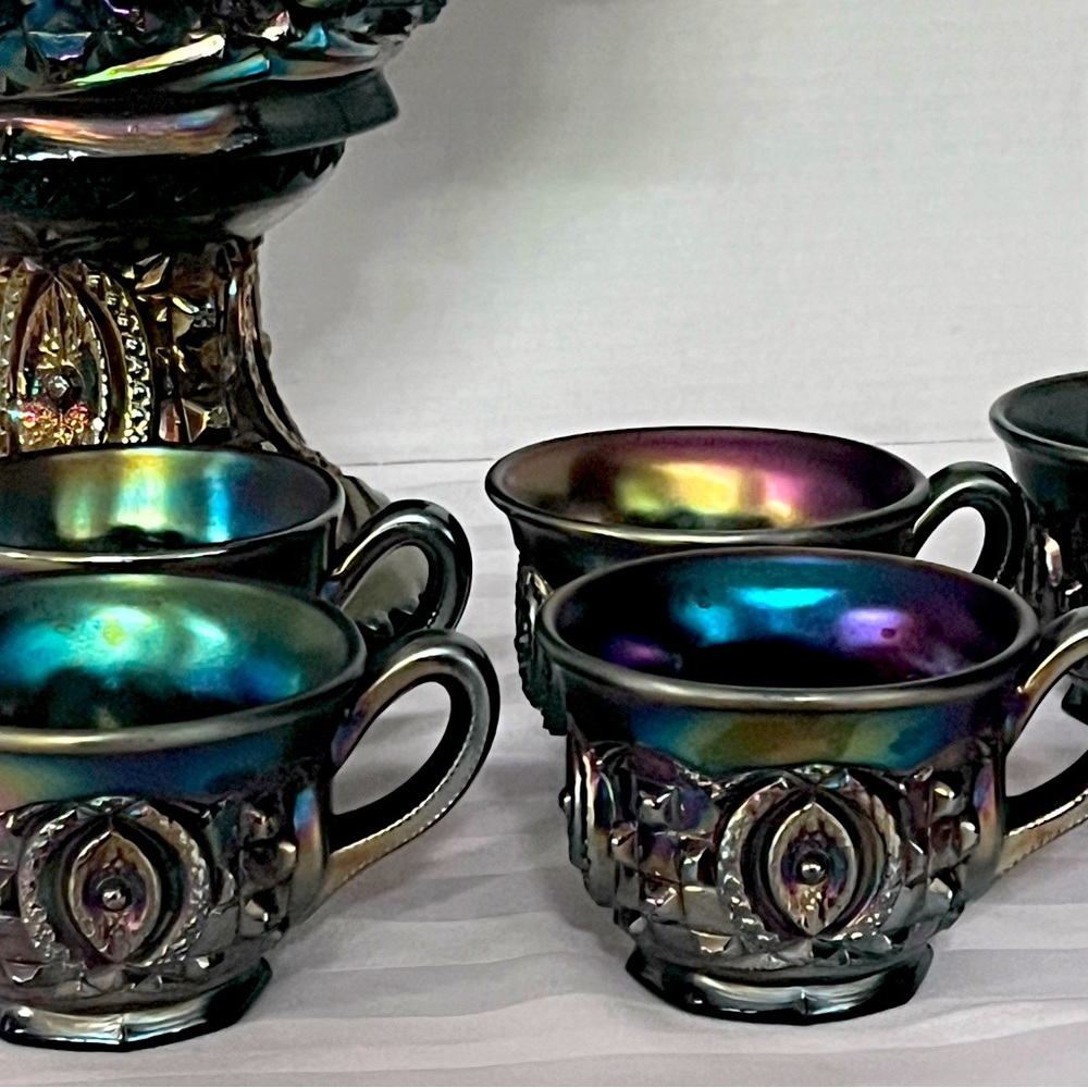 Iridescent Teacup Set with Ornate Design